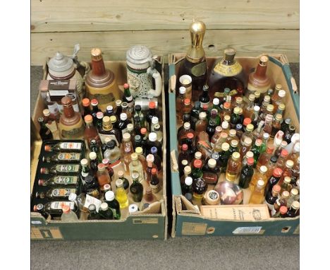 A collection of whisky miniatures, together with a bottle of Bells and Dimple and a set of Bush Mills, cased 