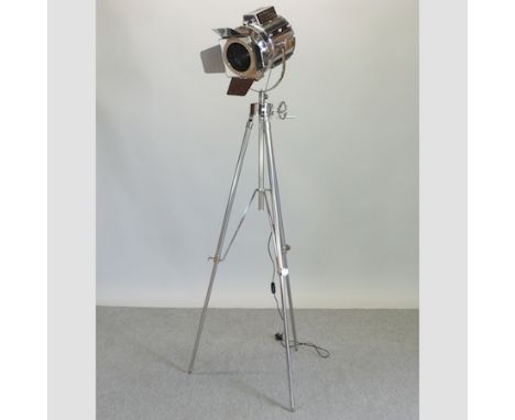 A reproduction stage lamp, on a tripod base, approximately 190cm tall