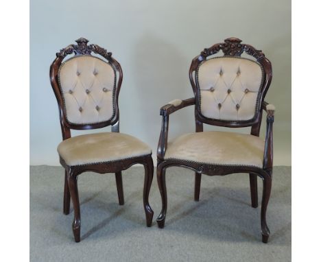 A set of four French style carved and cream upholstered button back dining chairs, to together with a pair of similar carver 