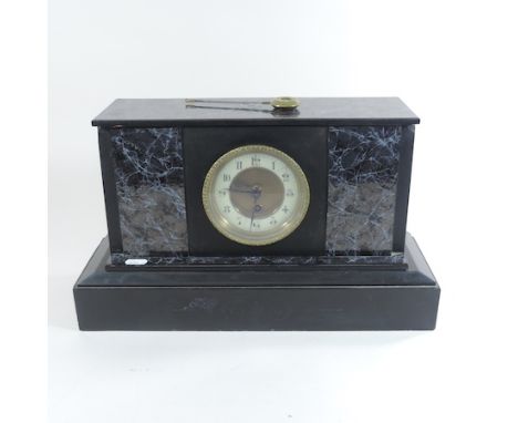 A 1920's black slate and simulated marble mantle clock, 25cm tall