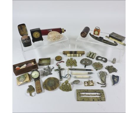 A collection of items, to include a 1930's miniature bakelite clock/tape measure, military buttons, inkwell and a scent bottl