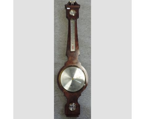 A reproduction mahogany cased banjo barometer, the silvered dial inscribed Comitti, Holborn, 98cm tall