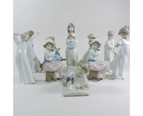 A collection of Nao figures, tallest 21cm