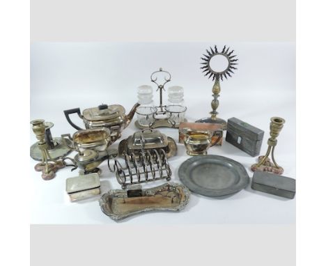 A collection of silver plated items and metal wares, to include a toast rack, tea service, chamber stick and candle snuffers