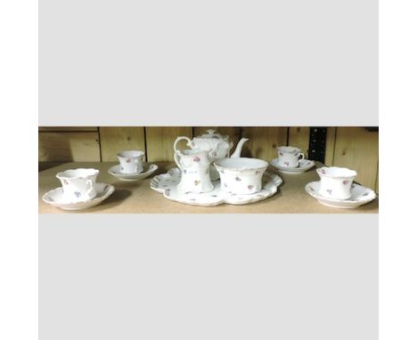 An early 20th century porcelain continental tea service, on tray