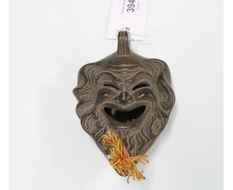 Greek stoneware mask head oil lamp, 13cm long 