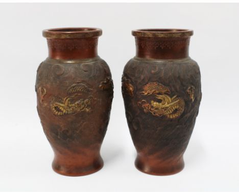 A pair of Chinese terracotta dragon vases, impressed seal mark, 24cm  (2) 