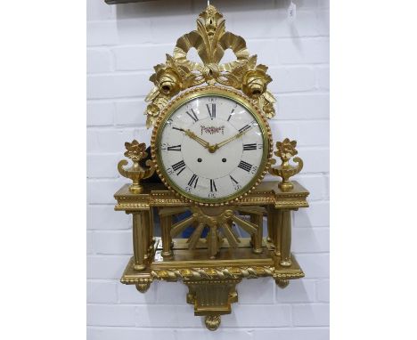 French giltwood cartel wall clock, surmounted by roses with a cream dial with Roman numerals, 85cm long 