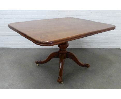Mahogany pedestal tilt top table, on a baluster turned column with ceramic castors,  75 x 137 x 103cm. 