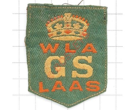 Womens Land Army, WWI Land Army Agricultural Section Good Service cloth Award. Glue mark to reverse. GC This badge was introd