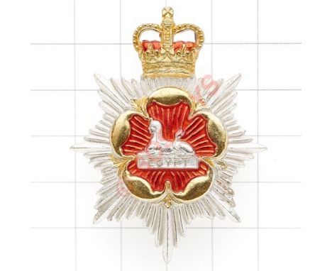 Royal Regiment of Gloucester & Hampshire Officer's cap badge circa 1969-70. Die-cast silver plate, gilt and red enamel short-