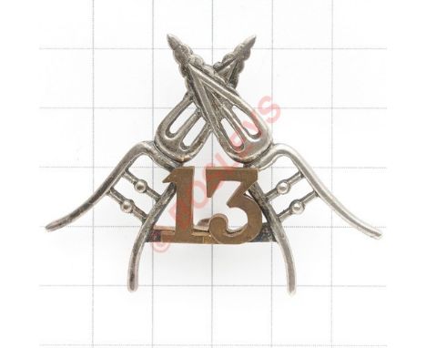 Indian Army. 13th Rajputs (The Shekhawati Regiment) head-dress badge circa 1903-22. Cast bi-metal crossed katars with applied