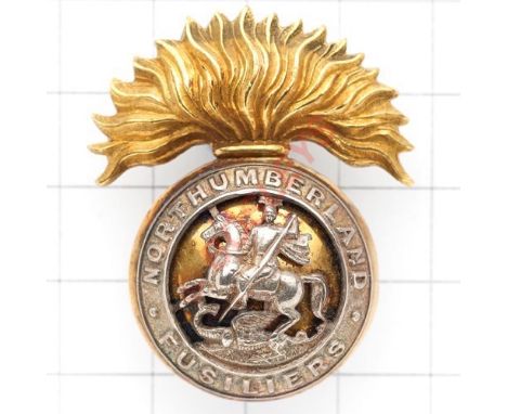 Northumberland Fusiliers Officer’s silver and gilt cap badge circa 1900-36. A fine die-cast gilt example with silver overlay.