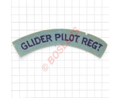 GLIDER PILOT REGT. cloth shoulder title. Embroidered mid-blue on light blue felt. Slight moth 