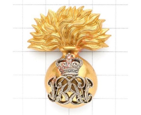 Grenadier Guards scarce Victorian Commissioned Quartermaster’s cap badge. Rich gilt flaming grenade, the ball mounted with si
