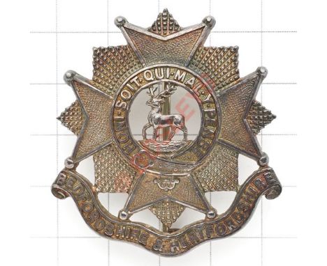 Bedfordshire & Hertfordshire Regiment WW2 Officer’s silver cap badge. Die-cast example. Reverse impressed “STERLING SILVER”. 