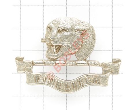 Indian Army. Bengal Mounted Rifles cap badge. British made die-stamped Tiger’s head resting on scroll inscribed “Fideliter”. 