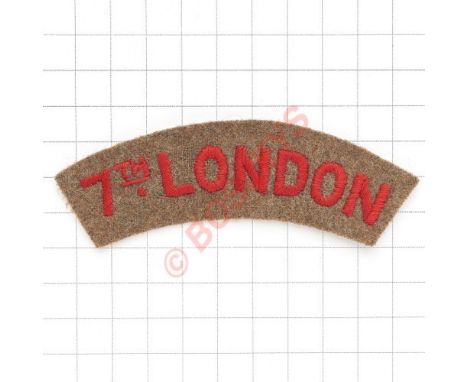 7th LONDON rare WW1 cloth shoulder title Red letters embroidered on khaki Light moth. VGC 