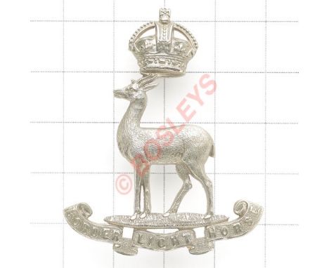 South African Border Light Horse slouch hat badge circa 1903-09. Die-stamped white metal crowned antelope on “Border Light Ho
