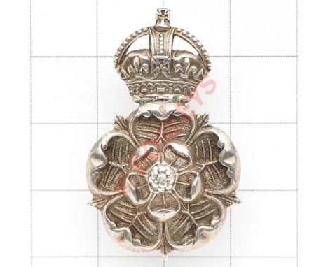 Yorkshire Dragoons Officer’s silver cap badge. A fine die-cast crowned rose. Reverse impressed “STERLING”. (as KK 2296) J.R. 