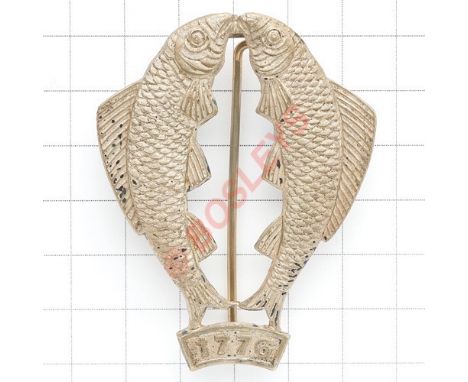 Indian Army. 1st Brahmans 1903-22 pagri badge. Die-stamped silvered “Fishes of Oudh” resting on a tablet inscribed “1776”. (C