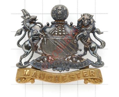 Manchester Regiment Officer’s silver and gilt cap badge circa 1896-1923. A fine die-cast example. Silver City Arms resting on