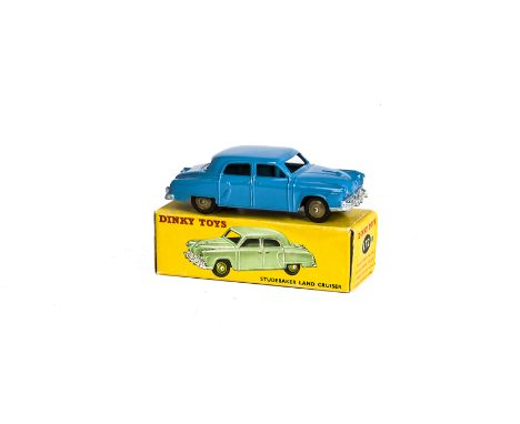 A Dinky Toys 172 Studebaker Land Cruiser, blue body, fawn hubs, in original box, E, box F 