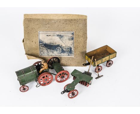 A Gunthermann Tinplate Clockwork Tractor Set, comprising Fordson Tractor with fixed key motor, Disc Harrow, Hayrake, Wagon an