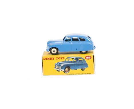 A Dinky Toys 153 Standard Vanguard, mid-blue body, cream hubs, in original box, E, box F-G 