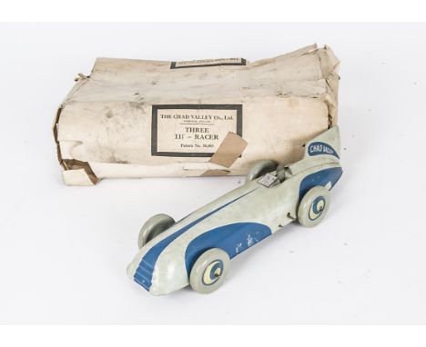 A Chad Valley Harborne 10003 clockwork Racing Car in Trade Box, tinplate grey and blue Racer, length 11ins, in an original tr