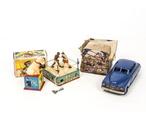 A JNF Tinplate Clockwork Indicator Car, dark blue body, detailed tinprinted interior, with boxed tinplate clockwork novelty b