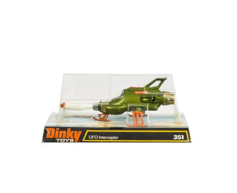 A Dinky Toys 351 U.F.O Interceptor, metallic green body, 'S.H.A.D.O' labels, white/orange missile, orange legs/skids, in orig