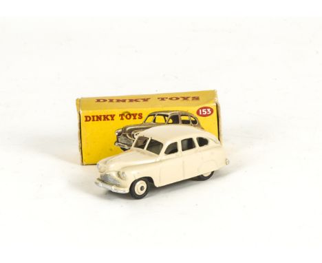 A Dinky Toys 153 Standard Vanguard, 3rd casting, cream body and hubs, in correct tan spot original box, VG-E, box F 