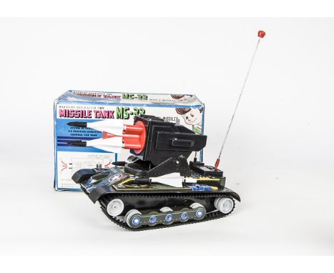 A Masudaya Modern Toys Tinplate Battery-Operated Missile Tank MS-33, large scale battery-operated tank, with lever control st