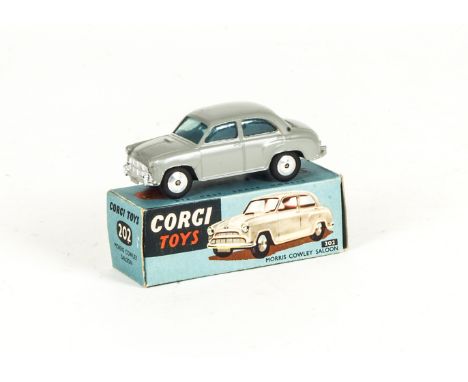 A Corgi Toys 202 Morris Cowley Saloon, grey body, flat spun hubs, in original box with leaflet, E, few small chips around fro