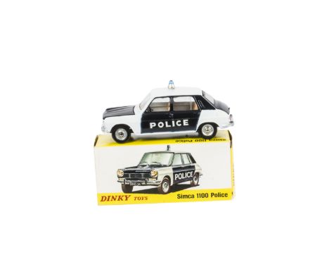 A French Dinky Toys 1450 Simca 1100 Police Car, dark blue/white body, brown interior, concave hubs, made in Spain, in origina