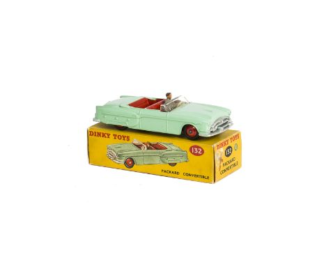 A Dinky Toys 132 Packard Convertible, light green body, red interior and hubs, grey driver, in original box, E, small stress 