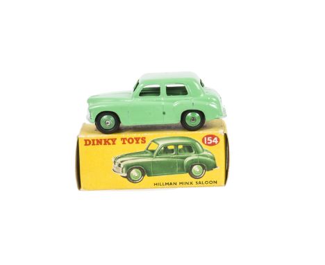 A Dinky Toys 154 Hillman Minx, pale green body and hubs, in original box, E, some small paint bubbles to doors, box F-G 