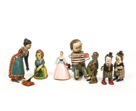 Tinplate Clockwork Figures, including Schuco Clowns (2), German Busy Lizzie, Japanese Cobbler, early German Clown with balloo