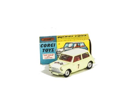 A Corgi Toys 227 Morris Mini-Cooper Competition Model, primrose yellow body, red interior, white roof and bonnet, RN7, in ori