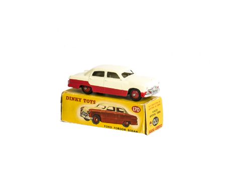 A Dinky Toys 170 Ford Fordor Sedan, two-tone lowline version, red lower body and hubs, cream upper body, in original box, E, 