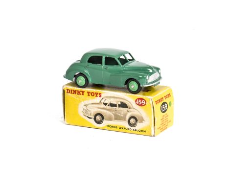 A Dinky Toys 159 Morris Oxford, dark green body, mid-green hubs, in original box, E, box P-F, end flaps repaired 