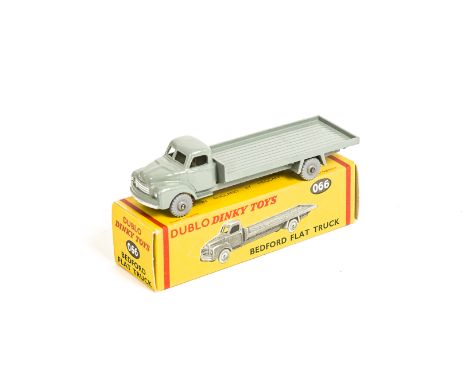 Dublo Dinky Toys 066 Bedford Flat Truck, scarce issue, grey body, knobbly grey plastic wheels, in original box, E, scratch to