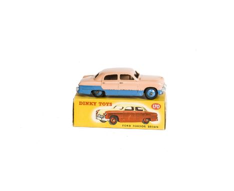 A Dinky Toys 170 Ford Fordor Sedan, two-tone lowline version, blue lower body and hubs, pink upper body, in original box, G, 