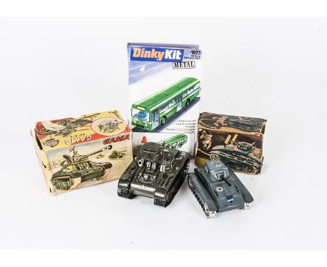 A Gama Tinplate Clockwork Montage-Tank 65/3, Arnold tinplate clockwork DC-6 Tank, in original boxes, with Dinky 1023 Single D