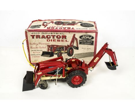 A Cragstan Tinplate Remote Control Ford 4000 Industrial Diesel Tractor, large scale battery-operated Ford 4000 Tractor in red