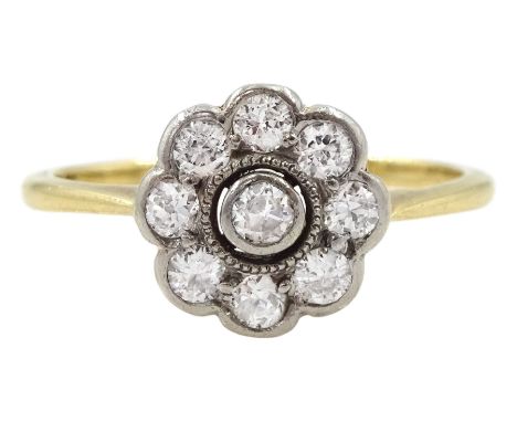 Gold milgrain set old cut diamond flower head cluster ring, stamped 18ctCondition Report:Approx 1.83gm, tested 18ct, size J, 