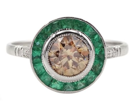 18ct white gold calibre cut emerald and fancy champagne colour diamond target ring, with diamond set shoulders, stamped 18K, 