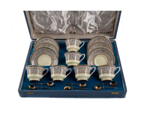 ROYAL WORCESTER 'LADY EVELYN' PATTERN COFFEE SET, comprising six cups, saucers and silver gilt spoons, the spoons by Walker &