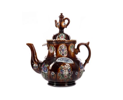 VICTORIAN BARGEWARE TEAPOT, the domed cover with teapot finial, the baluster body inscribed 'A PRESENT FROM A FRIEND 1888', a